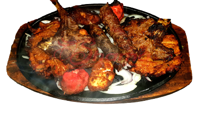 Our Mixed Sizzler for Two contains Onion Bhaji, Lamb Chops, Seekh Kebabs, Chicken Tikka and Fish Masala!