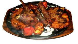 Our Mixed Sizzler for Two contains Onion Bhaji, Lamb Chops, Seekh Kebabs, Chicken Tikka and Fish Masala!